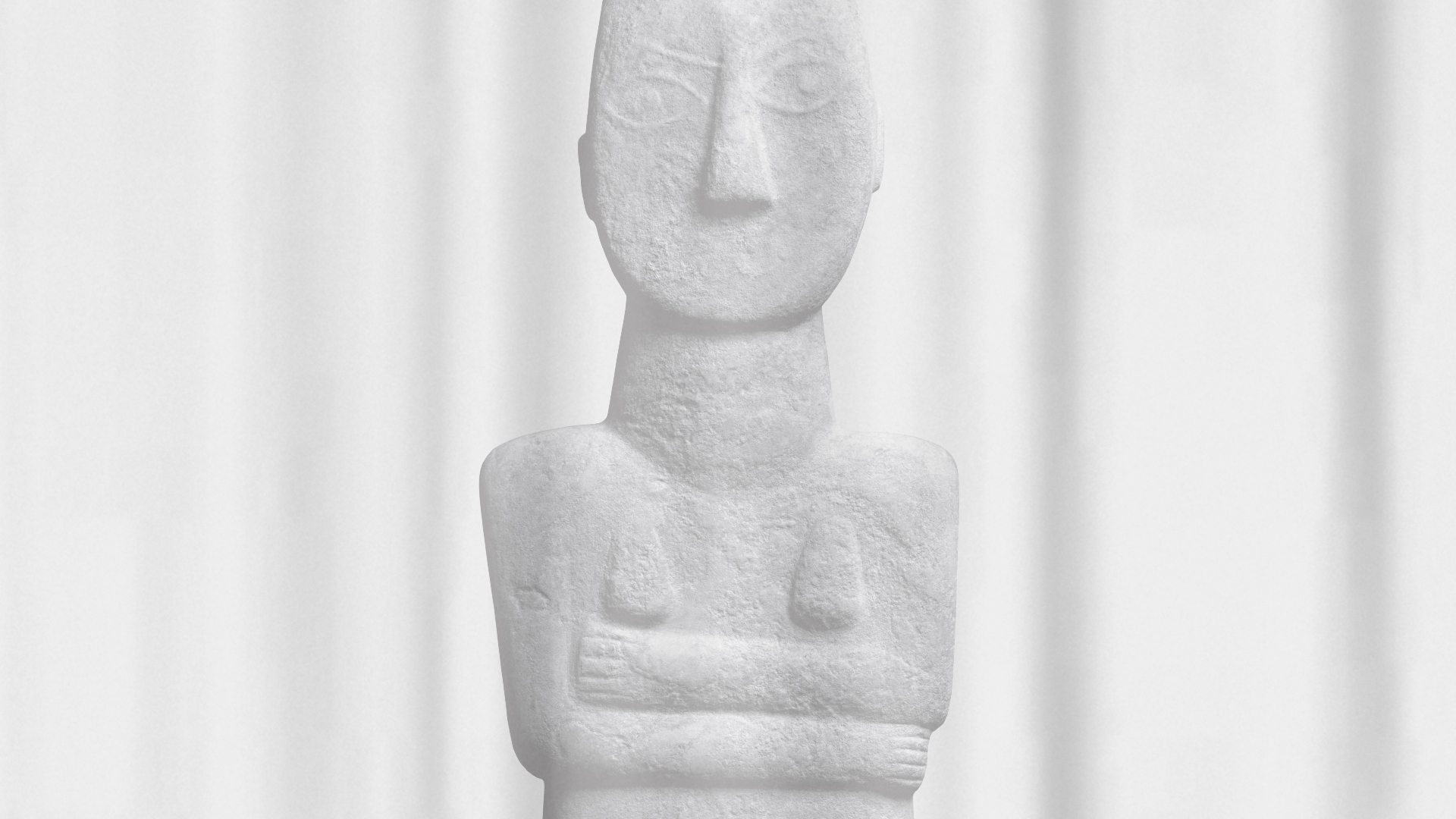 exhibition visual identity photo of a cycladic antiquity with crossed arms