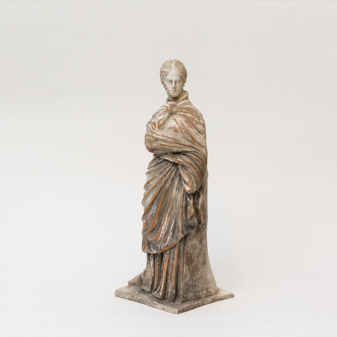 Tanagra Figurine with a Chiton