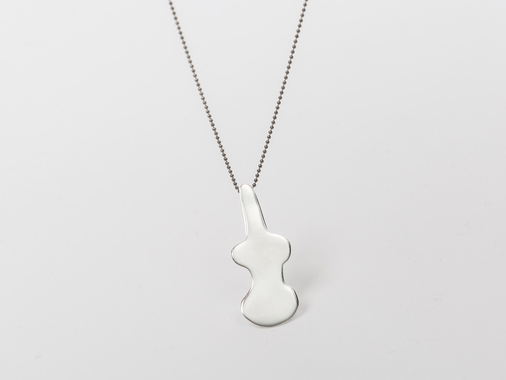 Pendant with Violin-Shaped Figurine