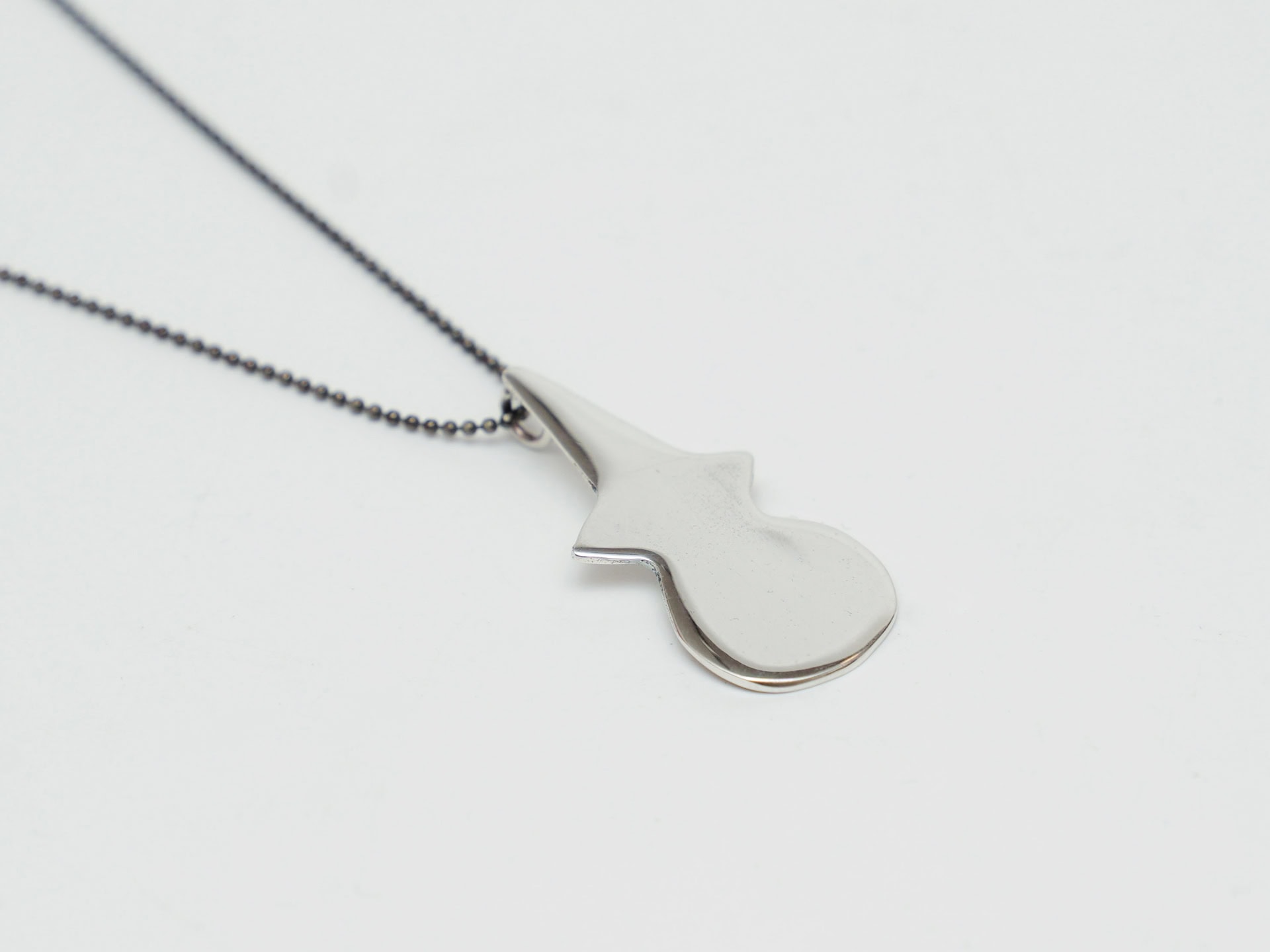 Pendant with Neolithic Violin Shaped Figurine