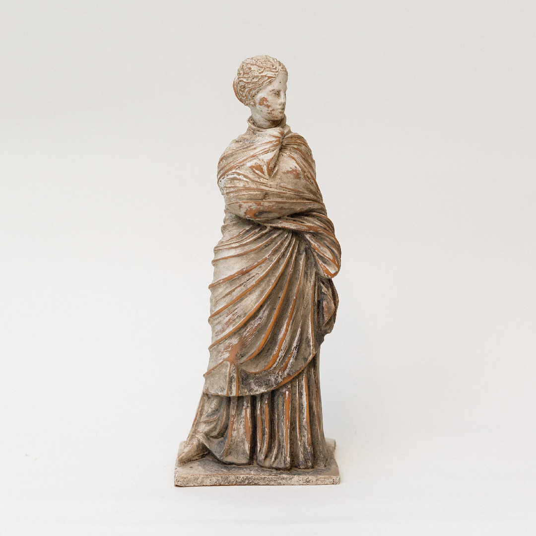 Tanagra Figurine with a Chiton