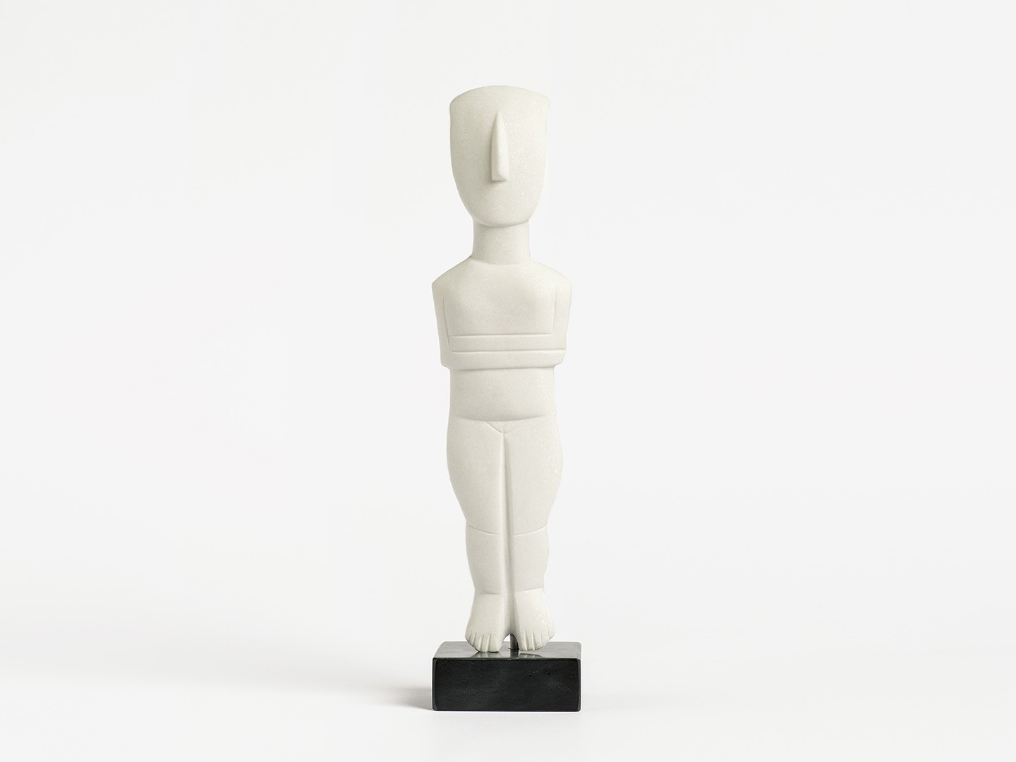 Marble Female Figurine with Traces of Colored Decoration