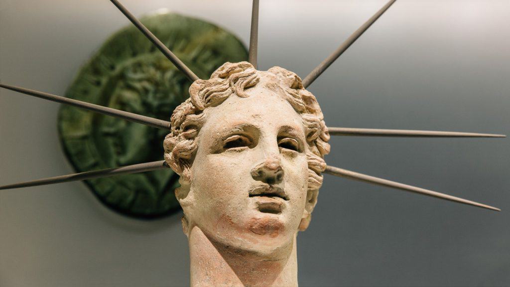 Rayed head of Helios, marble