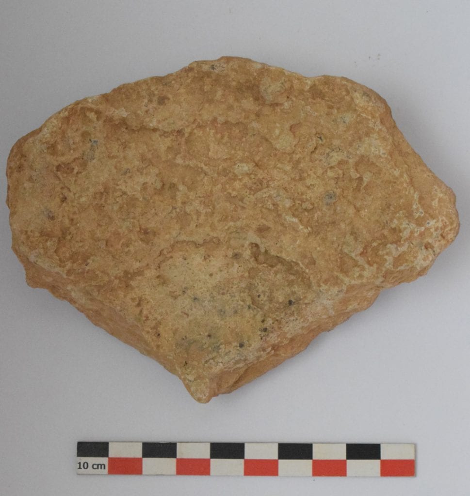 Litharge fragment from Akrotiraki