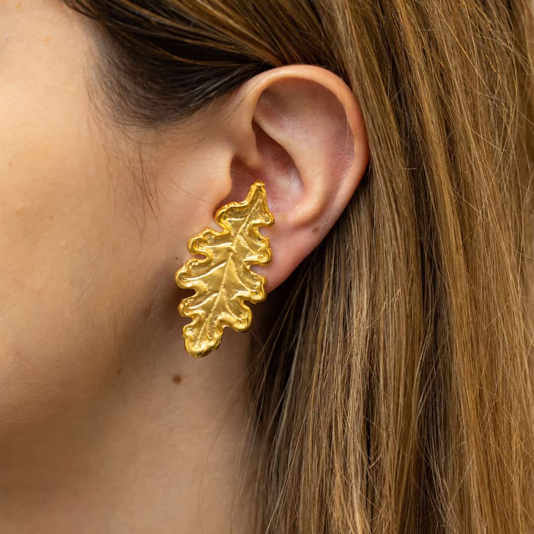 gold plated earrings in the shape of oak leaves
