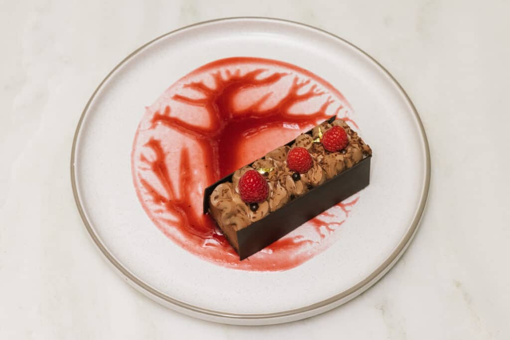 Bitter chocolate ganache with red fruits and anglaise sauce