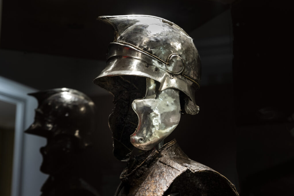 photo of silver-pleated iron helmet