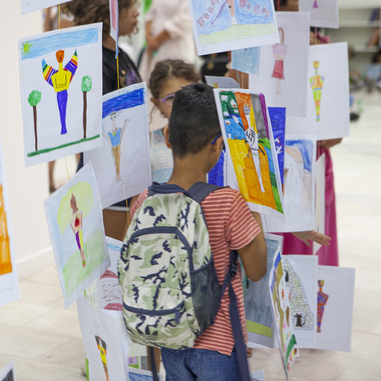 photo of children inside the festival exhibition space