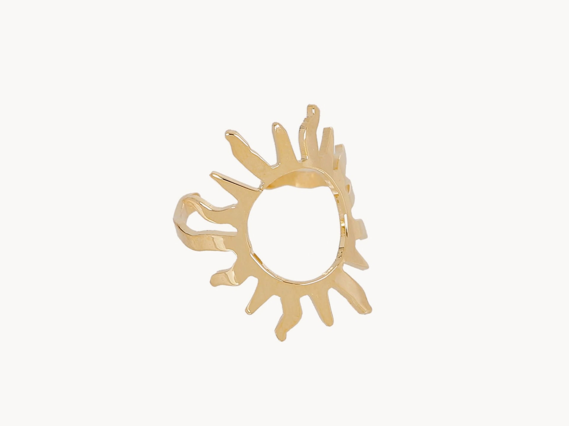 Gold plated ring with a sun.