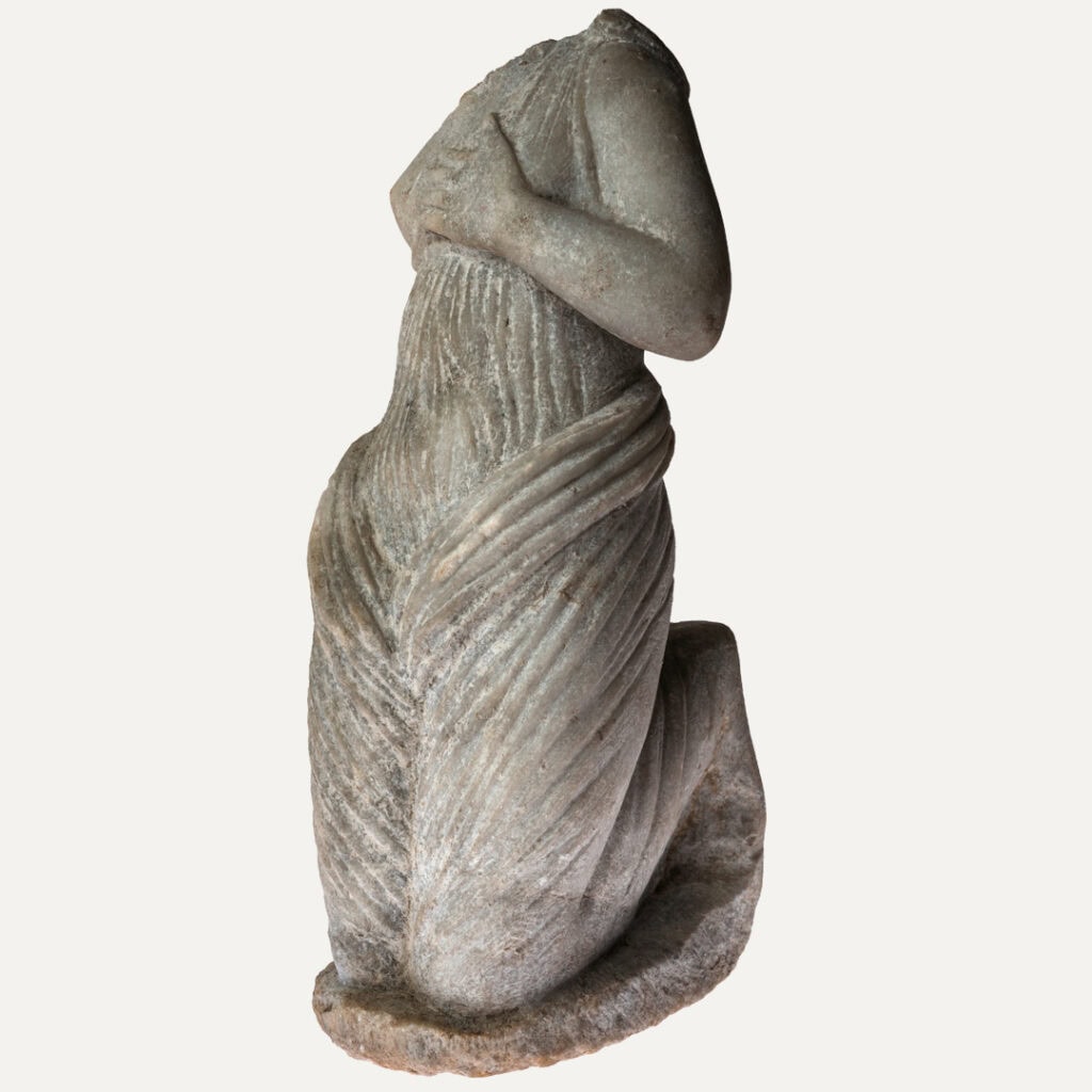 Marble statue of kneeling female mourner