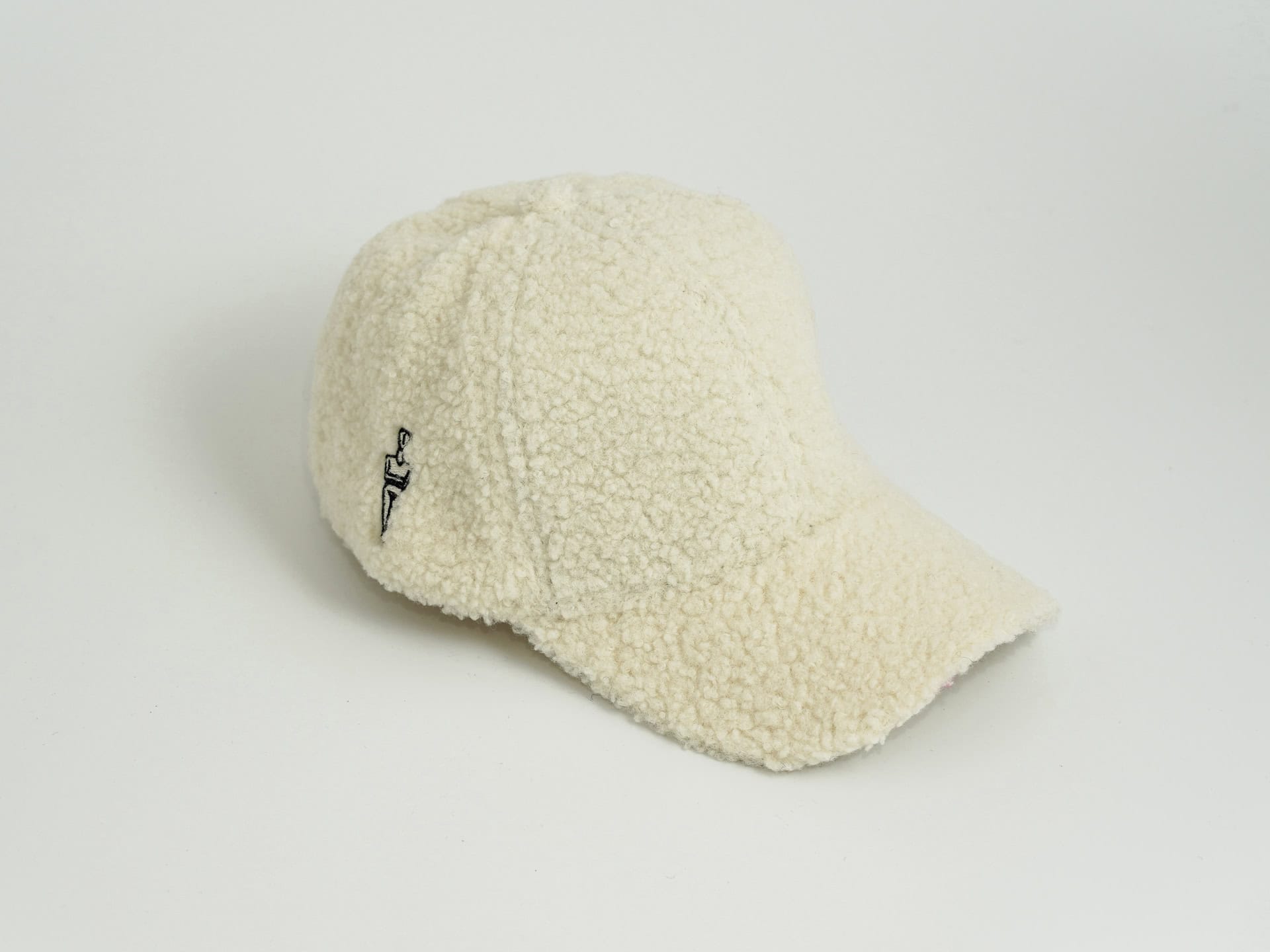 Shearling Cap with Cycladic Figurine – Beige