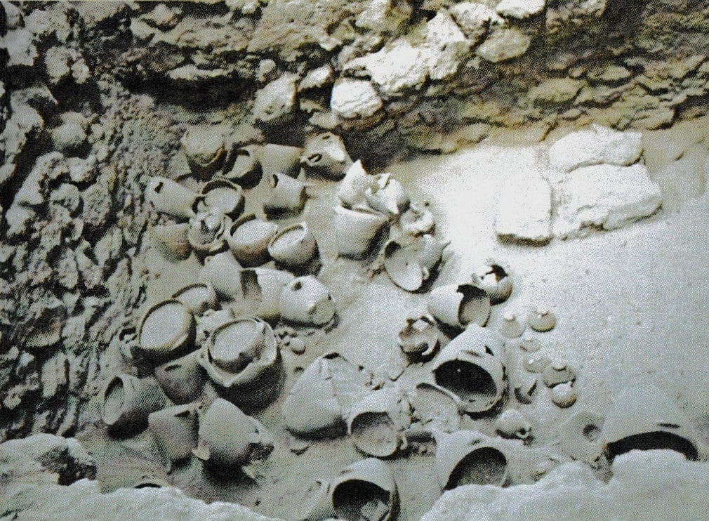 Tripod cooking pots in the ground floor room 2 of Building B in Akrotiri, Thera.
