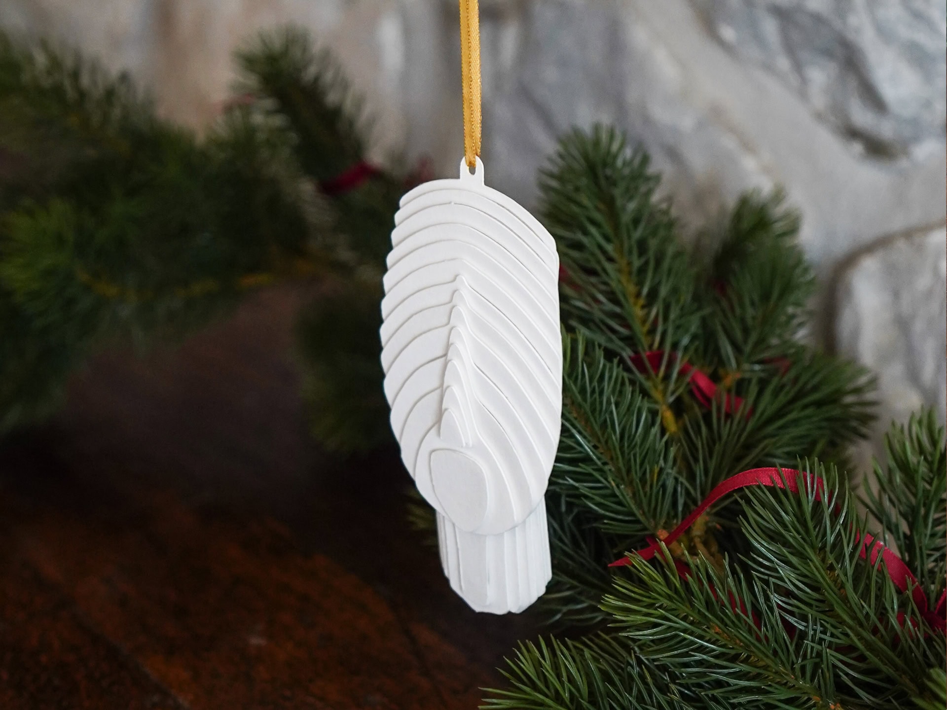 Στολίδι – Κεφαλή Κυκλαδικού Ειδωλίου